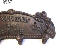 Load image into Gallery viewer, CAST IRON RUST FINISH HAIRCUT and SHAVE 25 cent COAT HOOK 12" Long - 723-0987
