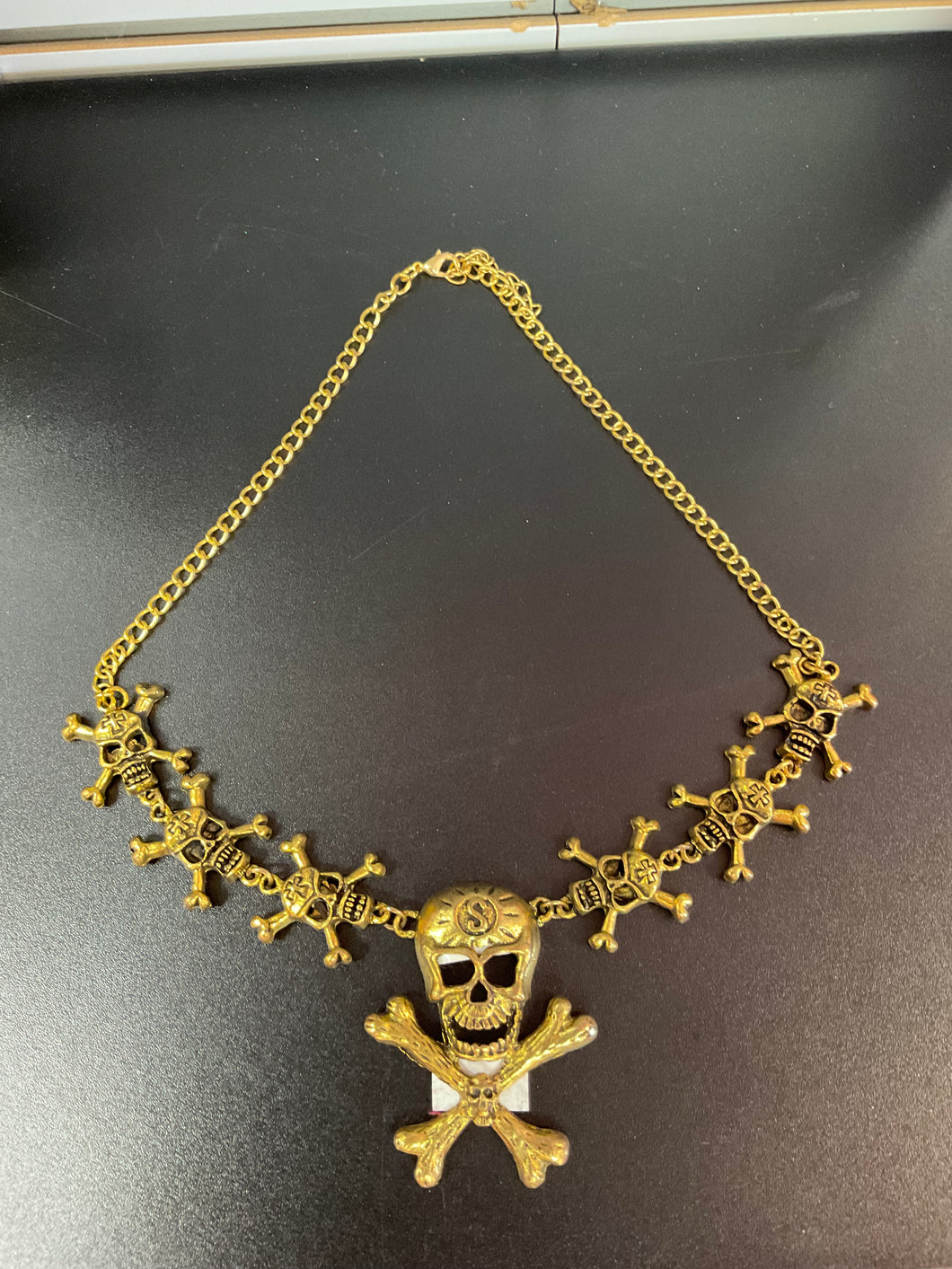 bronze skull necklace