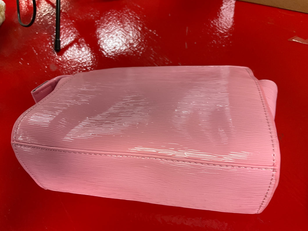 Pink clutch bag